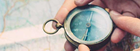 Hand holding a pocket watch